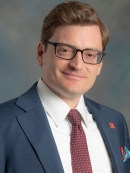 Ryan E. San George