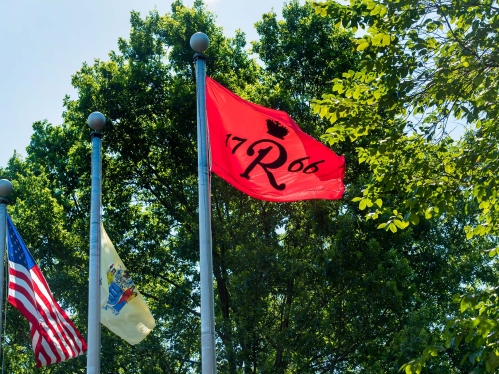 Flags displayed outside Old Queens